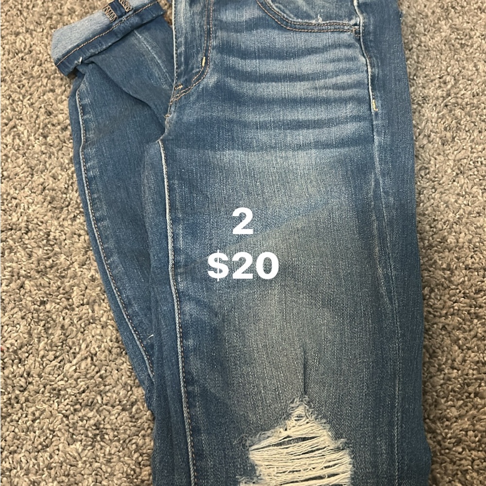 Distressed Blue Denim Jeans